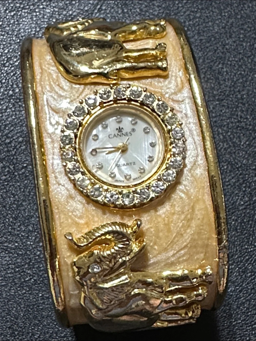 Cannes Gold Tone Elephant Hinged Enamel Clamper Bracelet Watch